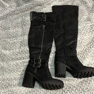 Thigh high black boots